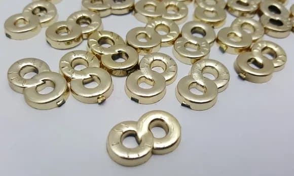 Aplique Símbolo do Infinito Dourado de 1,9cm - 20 unidades
