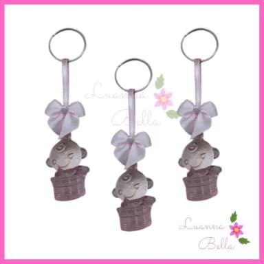 Chaveiro Bebe Rosa de acrílico c/lacinho -Pct c/ 5 unids